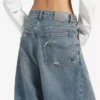 Baggy-Jeans für Damen mit tiefem Schritt in schmutzigem Vintage-Blau