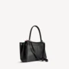 Damen-Handtasche «Rodeo» klein mit Anhängern in Schwarz Damen-Handtasche «Rodeo» klein mit Anhängern in Schwarz