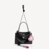 Damen-Handtasche «Rodeo» klein mit Anhängern in Schwarz Damen-Handtasche «Rodeo» klein mit Anhängern in Schwarz