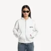 Damen-Hoodie «Salon de Couture» mit Reissverschluss und regulärer Passform in Weiss