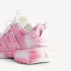Damen-Sneaker mit «Track»-Schablonenlogo in Pink/Weiss Damen-Sneaker mit «Track»-Schablonenlogo in Pink/Weiss