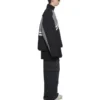 Gepolsterte Trainingsjacke mit Trichterkragen «Grey Black» 675462-TKO48-1000