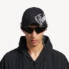 Herren-Cap «Cursive» in gewaschenem Schwarz Herren-Cap «Cursive» in gewaschenem Schwarz