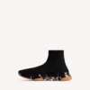 Herren-Sneaker «Speed 2.0» mit vollständig transparenter Sohle aus recyceltem Strick in Schwarz/Orange Herren-Sneaker «Speed 2.0» mit vollständig transparenter Sohle aus recyceltem Strick in Schwarz/Orange