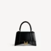 Kleine Damenhandtasche in Hourglass-Form in Schwarz