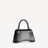 Kleine Damenhandtasche in Hourglass-Form in Schwarz