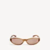 Neo-Sonnenbrille in runder Form mit blonden Streifen in Havanna Neo-Sonnenbrille in runder Form mit blonden Streifen in Havanna