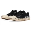 Paris Low-Top-Graffiti-Sneaker «Black and White Destroyed Cotton» 688757W3RR51099