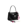 Rodeo Kleine Handtasche im Used-Look mit einem Anhänger «Schwarz» 7897792AA831000